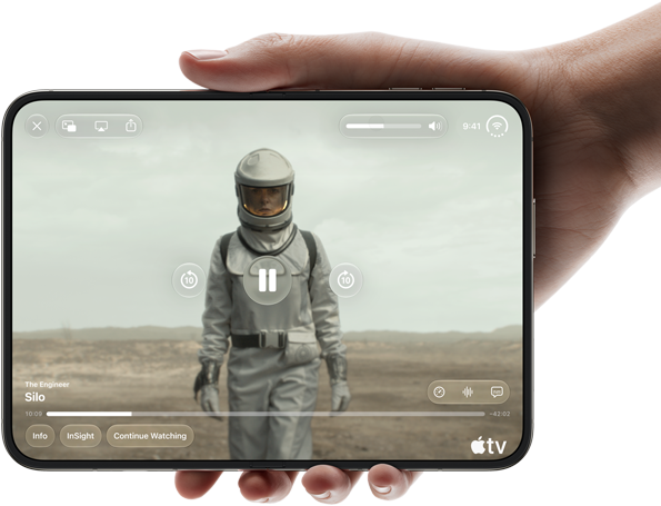 iPhone&nbsp;Duo, held with one hand, opened in horizontal orientation, fully unfolded, interior screen displays Apple&nbsp;TV show “Silo”