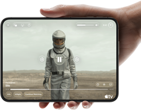 iPhone&nbsp;Duo, held with one hand, opened in horizontal orientation, fully unfolded, interior screen displays Apple&nbsp;TV show “Silo”