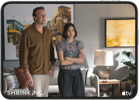iPhone&nbsp;Duo, opened in horizontal position, Apple&nbsp;TV show “Shrinking” plays on screen