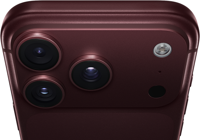 iPhone 18 Pro Max, burgundy colour (dark red), back exterior, Pro Fusion camera system at top, three lenses, variable aperture blades partially closed, flash, microphone and LiDAR Scanner, top exterior, mobile antenna, flat sides, rounded edges